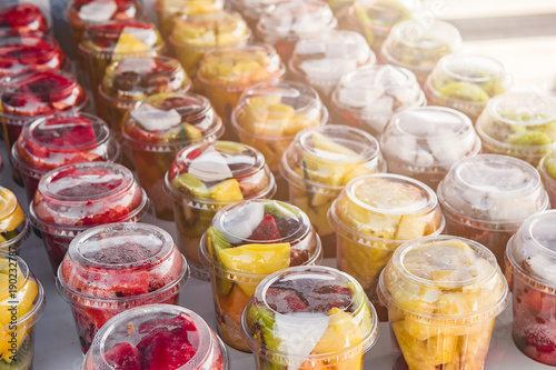 Fruit platter in cups on the counter in the market