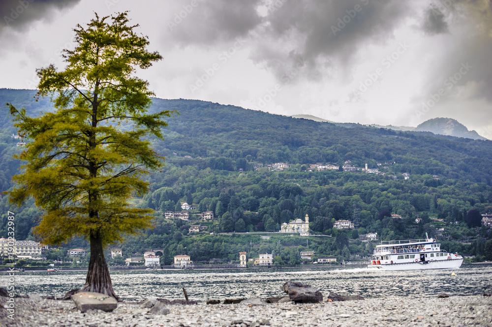 Fototapeta premium Italy, Stresa, Piedmont, boat sails on the waters