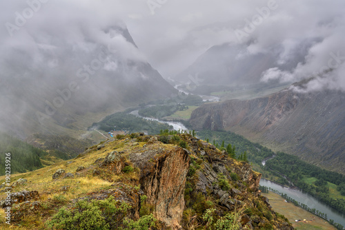 mountains valley river fog cloudy photo