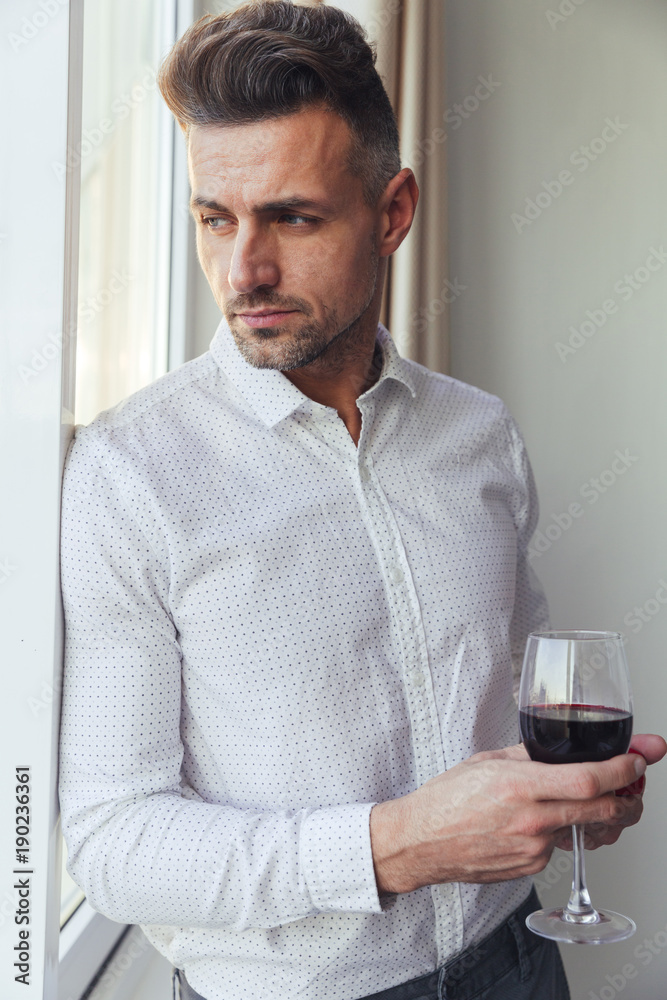 Portrait of a handsome pensive man dressed in shirt Portrait of a handsome pensive man dressed in shirt