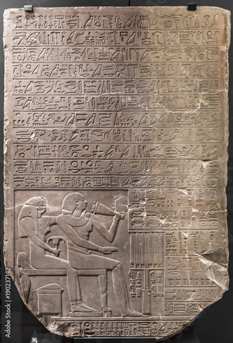 ancient stone relief at Chnum temple in Egypt photo