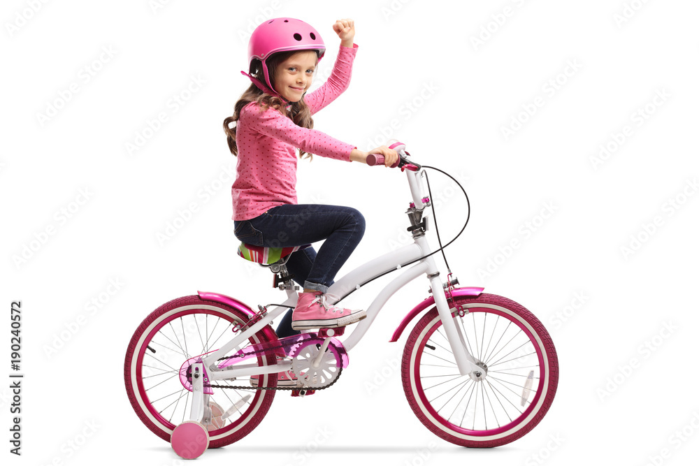 Naklejka premium Little girl with a bicycle gesturing with her hand
