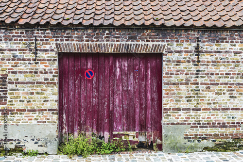 Wooden door of an old abandoned building
