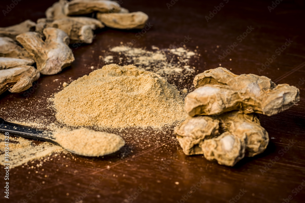 Close up of Extracted water of dried ginger,Zingiber officinale or soth with raw dried ginger. Close up of Extracted water of dried ginger,Zingiber officinale or soth with raw dried ginger.