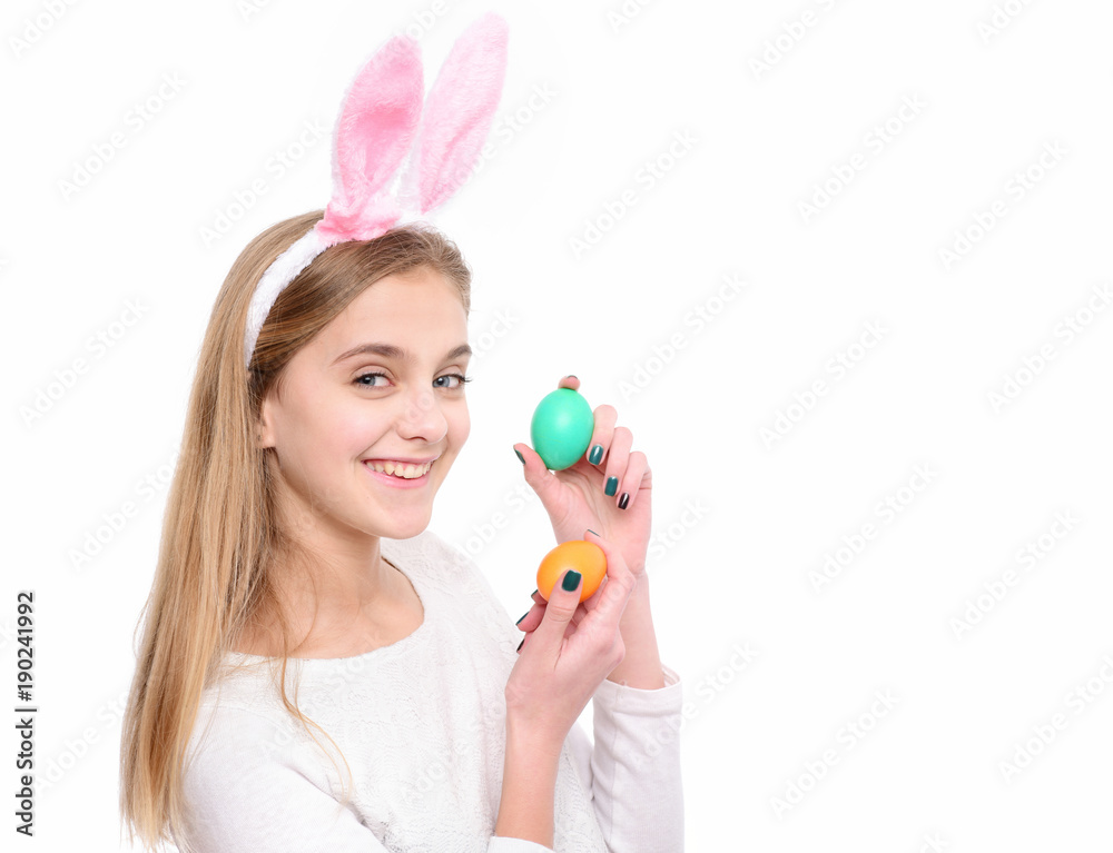 Girl in bunny ears smile with eggs, Easter hunt Girl in bunny ears smile with eggs, Easter hunt