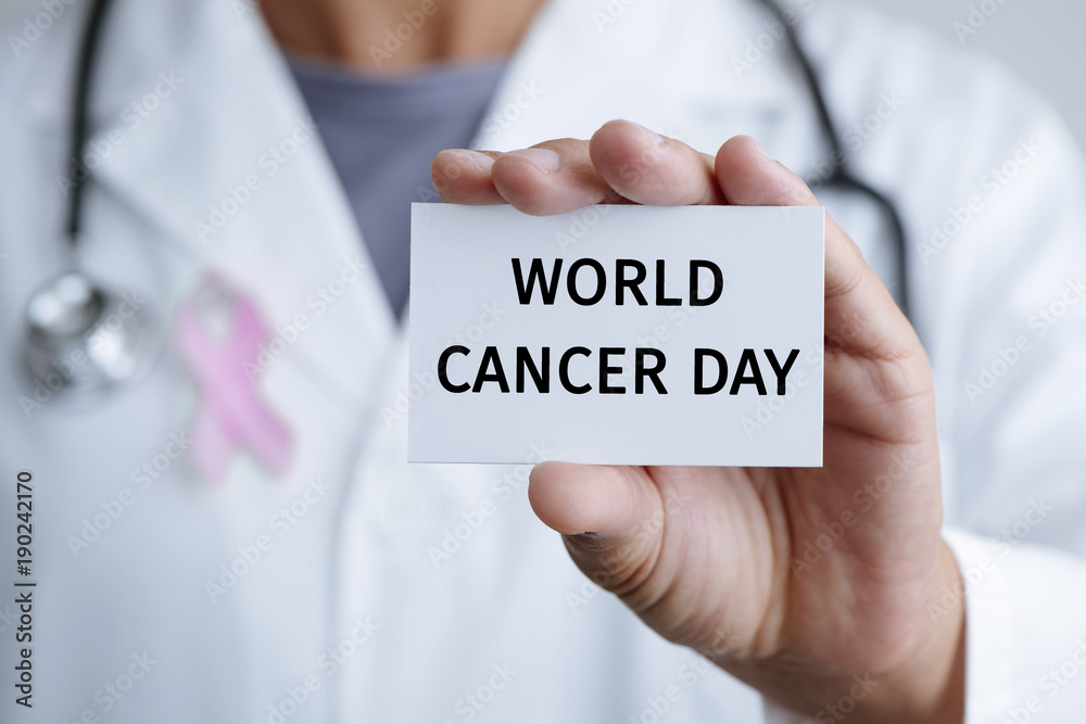 doctor and signboard with text world cancer day doctor and signboard with text world cancer day