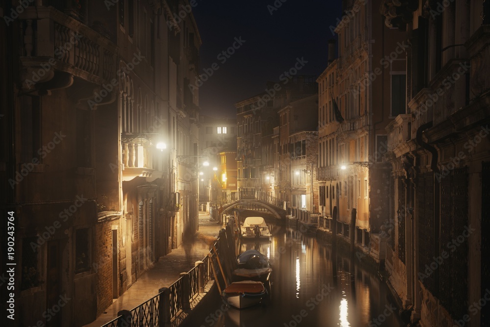 Venice canal misty night