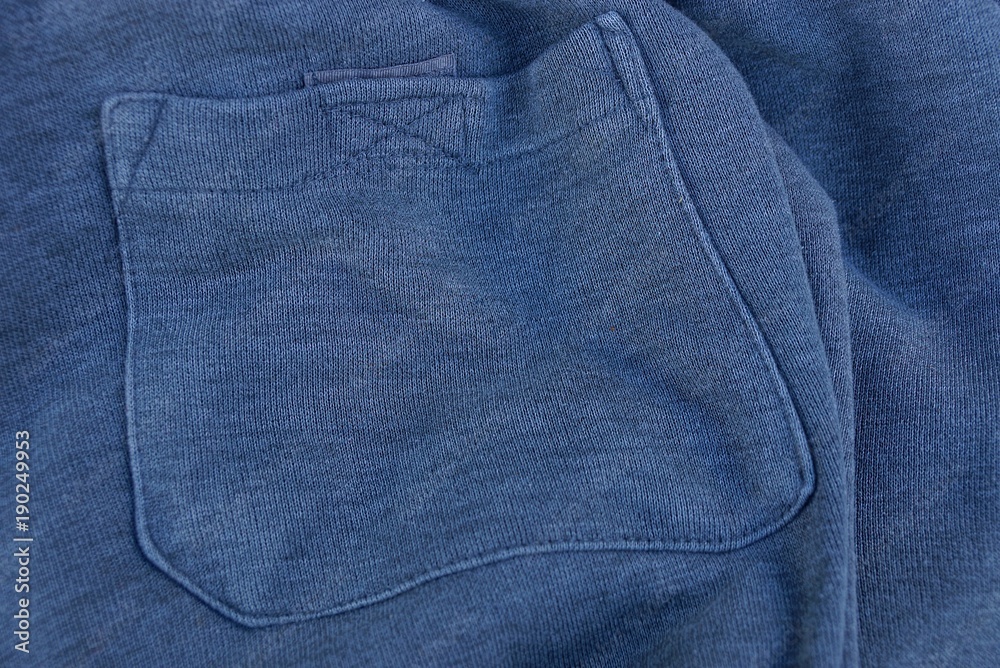 серая текстура ткани с карманом