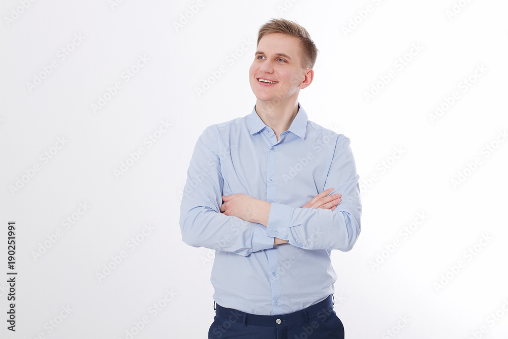 Young businessman isolated on white light background. Copy space and mock up. Business concept Young businessman isolated on white light background. Copy space and mock up. Business concept