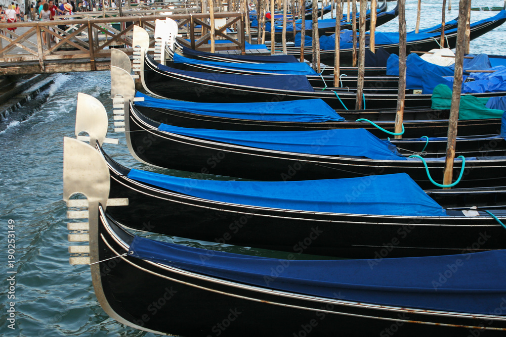 Blue gondolas in Venice on the joke.