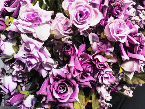 Rose fake flower and Floral background. rose flowers made of fabric. The fabric flowers bouquet. Colorful of decoration artificial flower