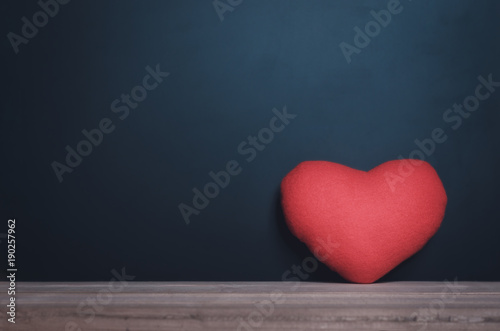 red heart love on wood table with blackboard. love concept. valentine day concept. valentines background.
