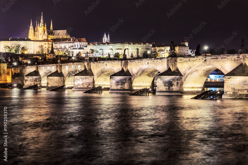 View of Prague Castle and Charles Bridge at night.Czech Republic.