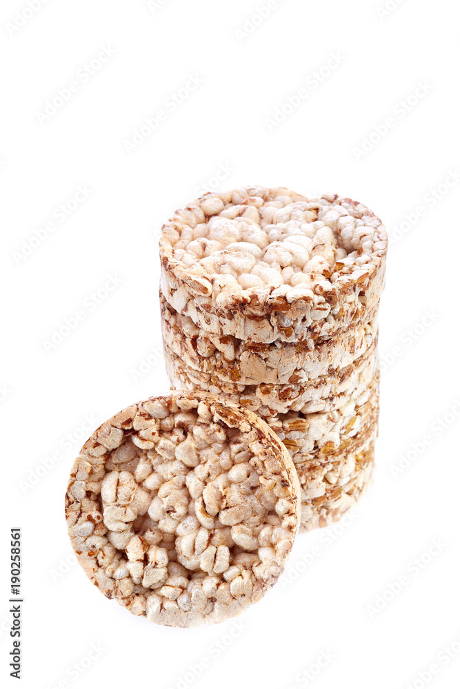 Round wheat crispbread, white background. Composition of crispbread on white background. Round wheat crispbread, white background. Composition of crispbread on white background.