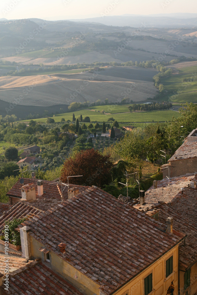Summer. A typical Italian village. Montepulciano. View of the roofs of houses