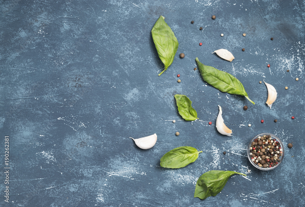 Basil Leaves, pepper and garlic on concrete background. Basil Leaves, pepper and garlic on concrete background.