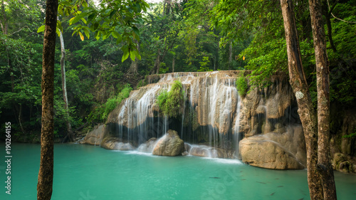 Breathtaking green waterfall at deep forest, Erawan waterfall located Kanchanaburi Province, Thailand