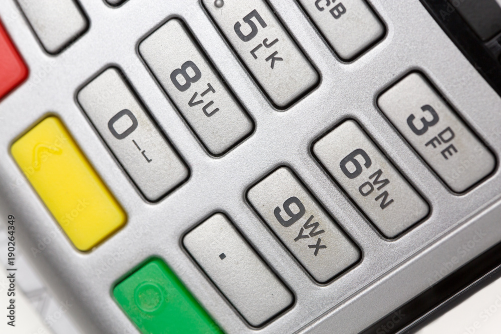 closeup on payment terminal isolated on white background closeup on payment terminal isolated on white background