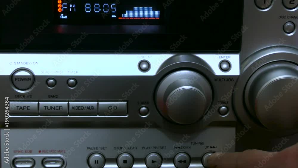 Caucasian male hand searching on fm radio band without success. Caucasian male hand searching on fm radio band without success.