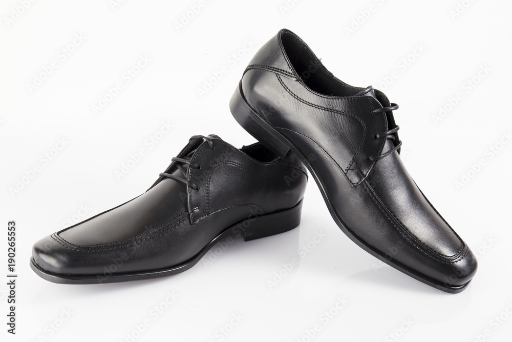 Male black leather elegant shoe on white background, isolated product, comfortable footwear. Male black leather elegant shoe on white background, isolated product, comfortable footwear.