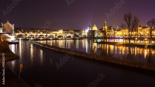 Charles Bridge and buildings along the Vltava at night, in Prague, Czech Republic © k_samurkas
