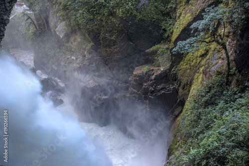Devil's Cauldron waterfall (spanish: Pailon del Diablo) - Mountain river and fall in the Andes. Banos. Ecuador