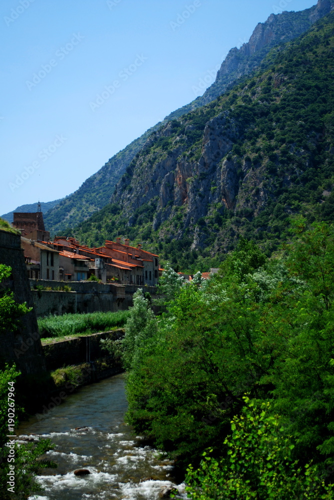 The River Tet runs by the pretty walled town of Villfranche de Conflent in the south of France. This medieval city dates back to the 11th century
