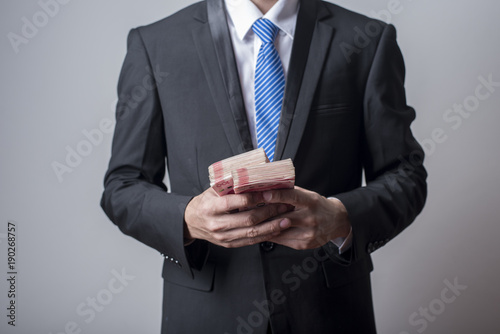  Business man holding China money