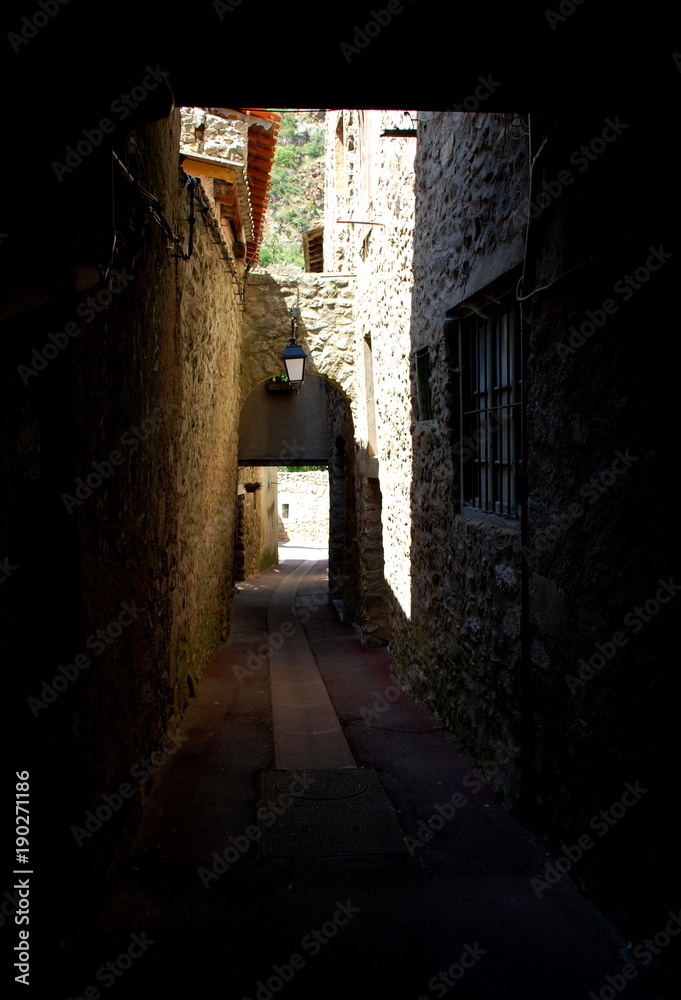 A quiet backstreet in the pretty walled town of Villfranche de Conflent in the south of France. This medieval city dates back to the 11th century