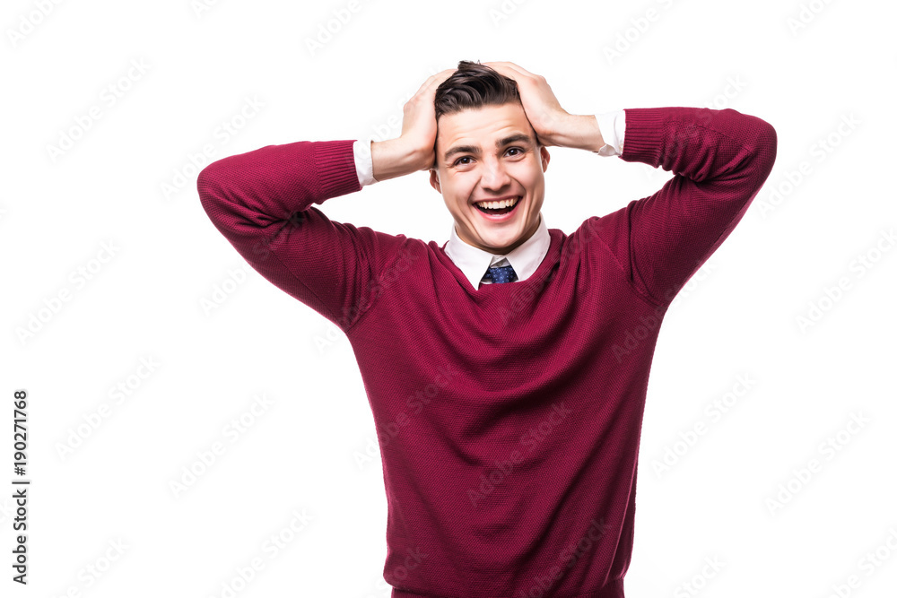 Young crazy smile mad man head in his hands isolated on white background Young crazy smile mad man head in his hands isolated on white background