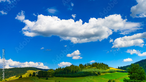 beautiful landscape with gorgeous cloudscape over the hills of Pieniny mountains