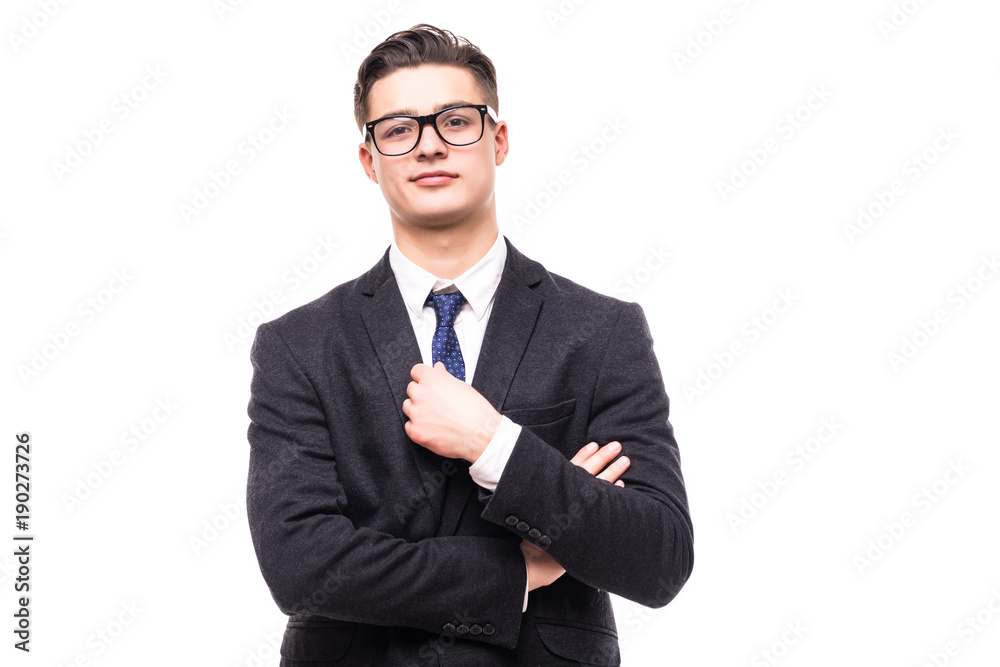 Portrait of happy smiling businessman in crossed arms pose, in black confident suit, against grey background. Caucasian male model at studio shot. Business and success concept. Portrait of happy smiling businessman in crossed arms pose, in black confident suit, against grey background. Caucasian male model at studio shot. Business and success concept.