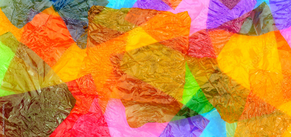 Colourful cellophane sweet wrapper background