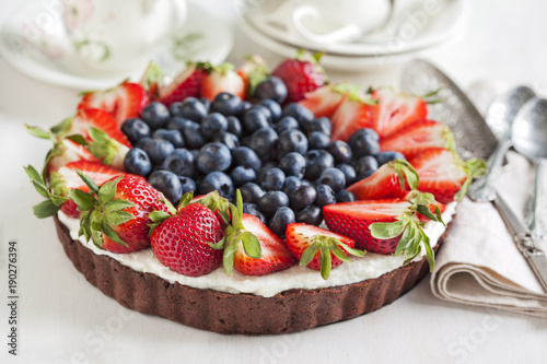 Ricotta tart with strawberry and blueberry