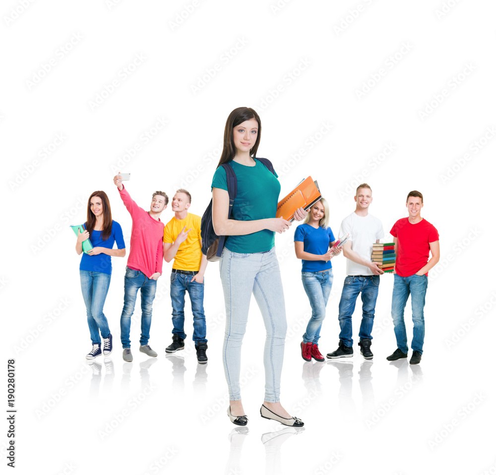 Obraz premium Large group of teenage students isolated on white background. Many different people standing together. School, education, college, university concept.