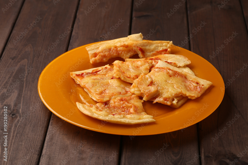 homemade pizza on wooden table homemade pizza on wooden table