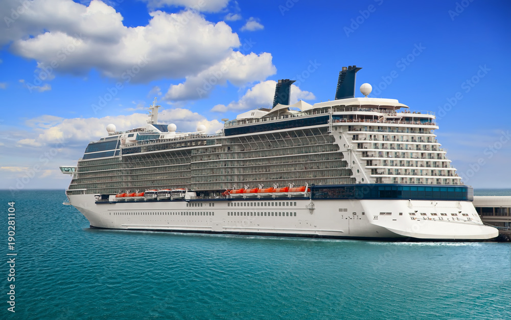 Luxury Cruise Ship in Port on sunny day