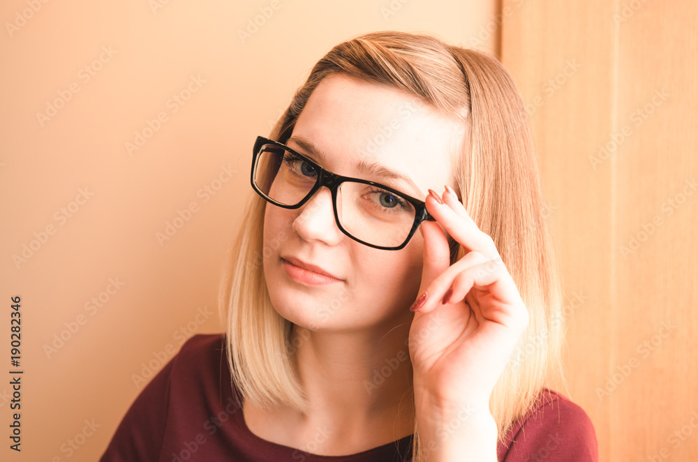 Beautiful young woman wearing glasses Beautiful young woman wearing glasses
