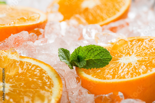 Orange slices in ice, macro.