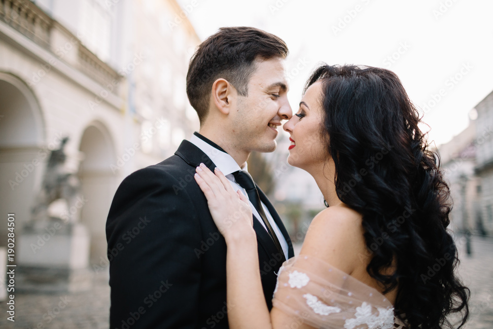 Portrait of a romantic beautiful couple traveler walking in the 