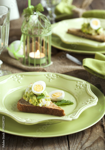 Mashed Egg and Avocado Sandwiches on the festive Easter table