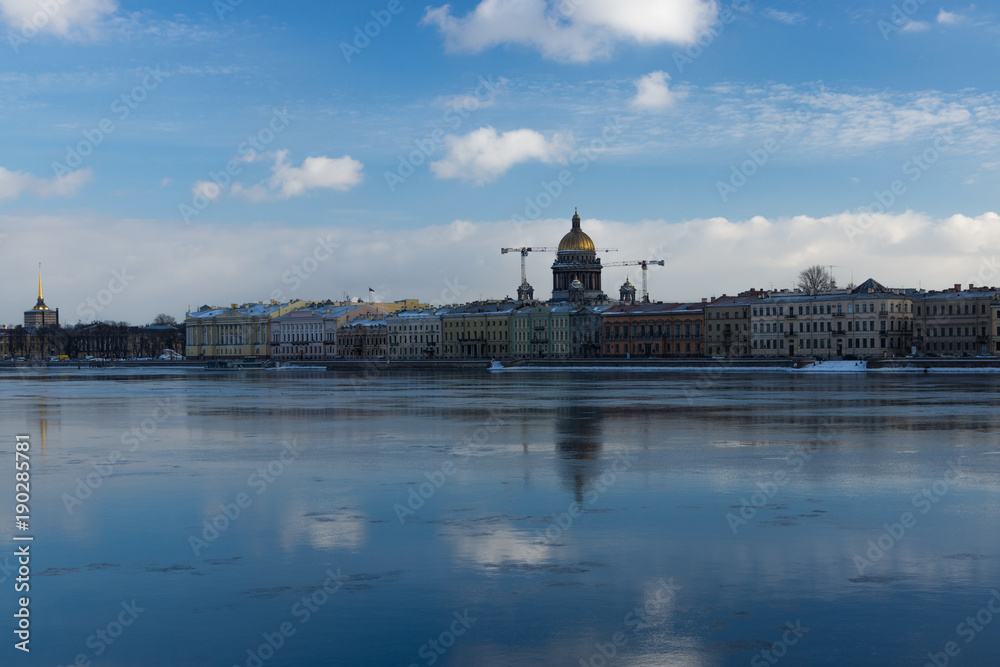 Ice flow on the Neva river and Isaac Cathedral in St.Petersburg, Russia