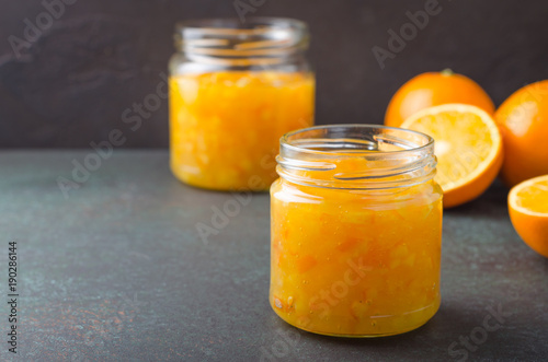 Orange jam and oranges