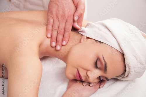 Woman is having a massage in salon