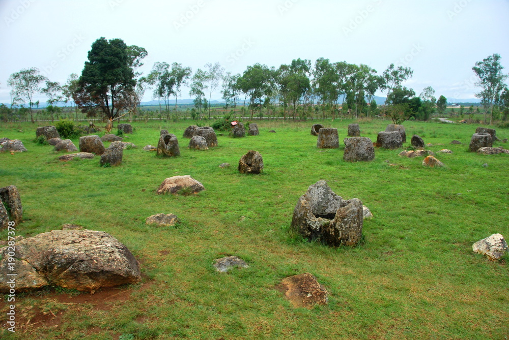 Giant megalithic stone urns at the Plain of Jars archaeological site in Loas. This area is also the world's most heavily bombed place from the Vietnam War