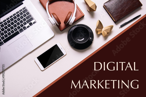 Business background with electronic devices like notebook or mobile phone. Workplace of CEO, chef director, manager or designer. Office flat lay to write words down. Modern informational technologies 