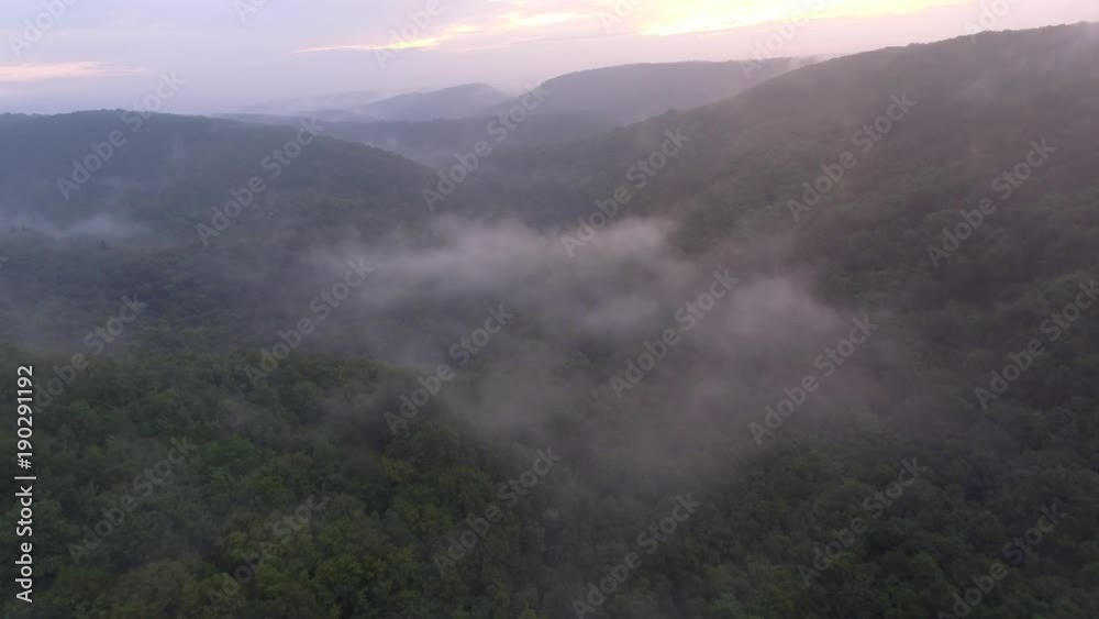 Tropical rainforest with misty forest fog, aerial view. Tropical rainforest with misty forest fog, aerial view.