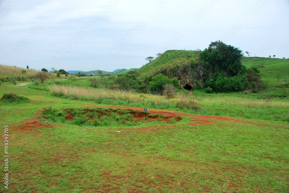 Bomb craters from the Vietnam War surround giant megalithic stone urns at the Plain of Jars archaeological site in Loas. This area is the world's most heavily bombed place Bomb craters from the Vietnam War surround giant megalithic stone urns at the Plain of Jars archaeological site in Loas. This area is the world's most heavily bombed place