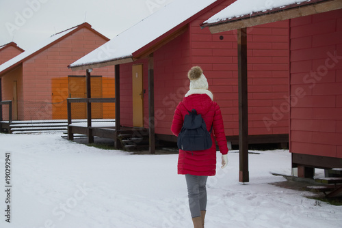 Wallpaper Mural Traveler woman is walking through a campsite in winter season. Torontodigital.ca
