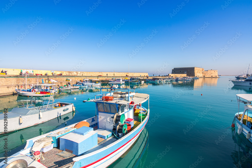 Heraklion harbour with old venetian fort Koule and shipyards, Crete, Greece